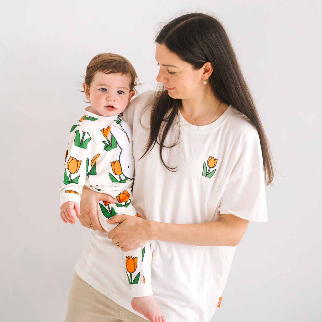 Child wearing the Miffy in the Meadow tulip print bamboo lounge set